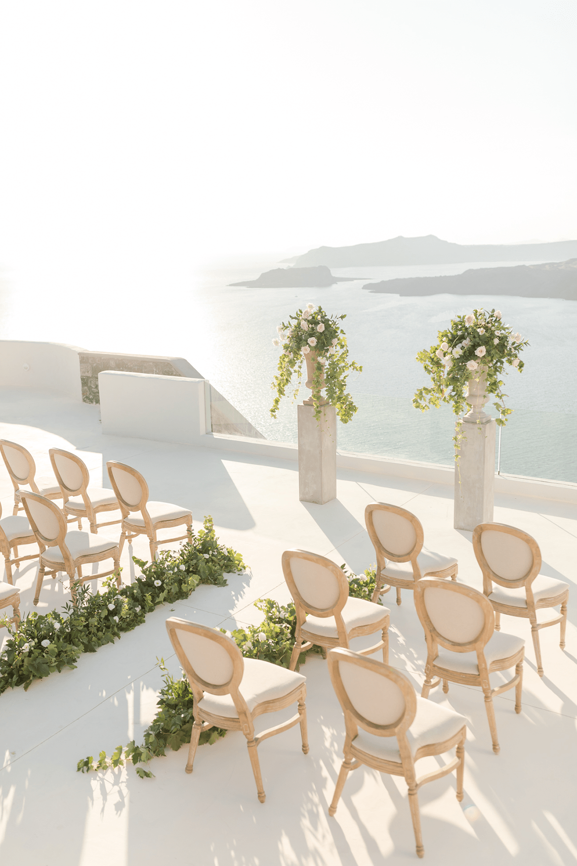 Pale Blue Greek Micro Wedding on the Cliffs of Santorini Kimonas Photography 15 - Chi Phí Phát Trực Tiếp Đám Cưới Của Bạn Là Bao Nhiêu?