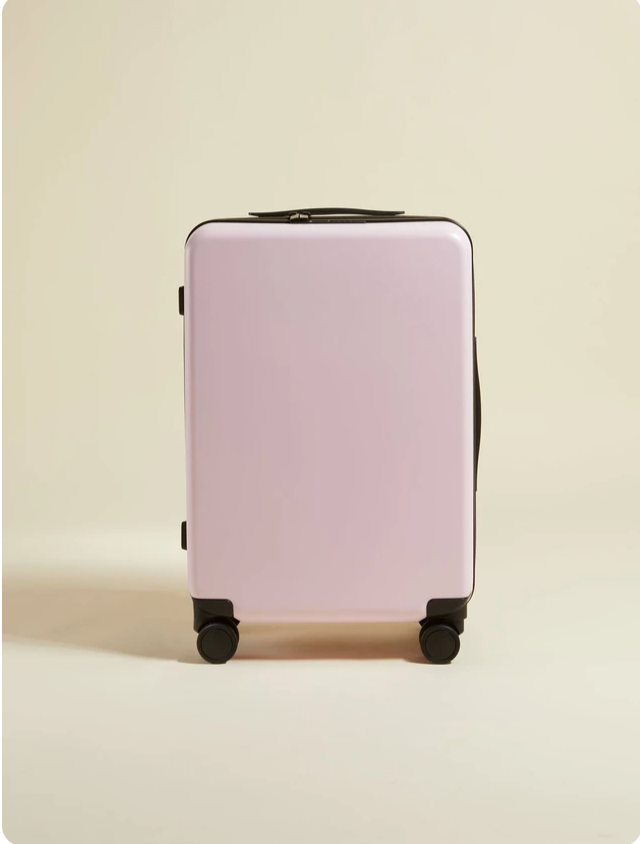 Pink carry-on suitcase