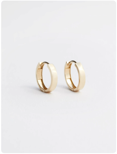 Gold huggie style earrings